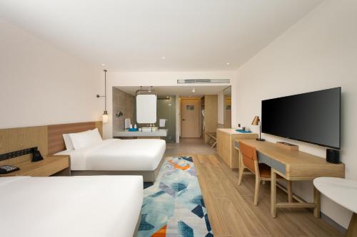 Imagen de la habitación del Hotel Holiday Inn Hainan Xiangshui Bay, an IHG. Foto 19