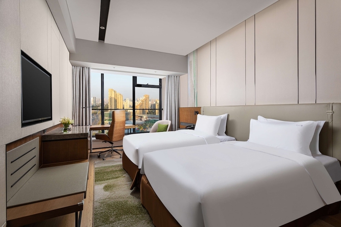 Imagen de la habitación del Hotel Holiday Inn Hangzhou Binjiang. Foto 8