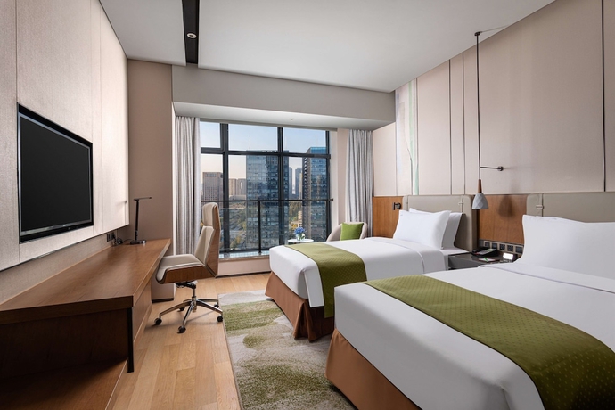 Imagen de la habitación del Hotel Holiday Inn Hangzhou Binjiang. Foto 9