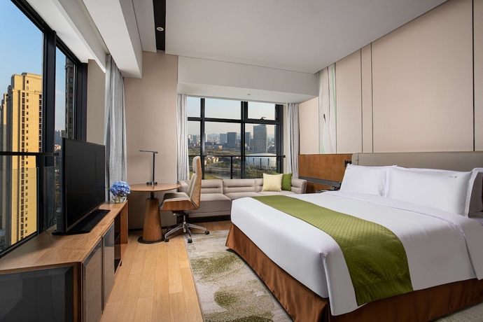 Imagen de la habitación del Hotel Holiday Inn Hangzhou Binjiang. Foto 10