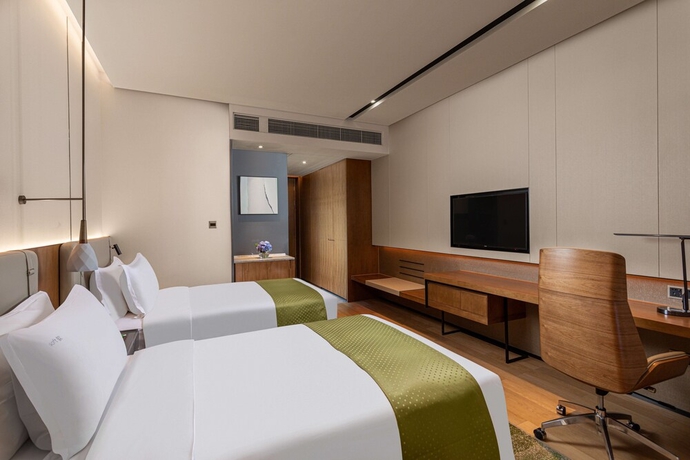 Imagen de la habitación del Hotel Holiday Inn Hangzhou Binjiang. Foto 13