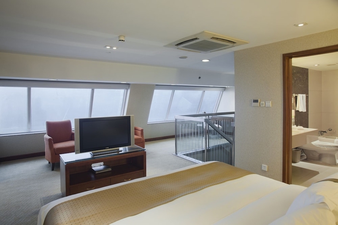 Imagen de la habitación del Hotel Holiday Inn Hangzhou City Center. Foto 13