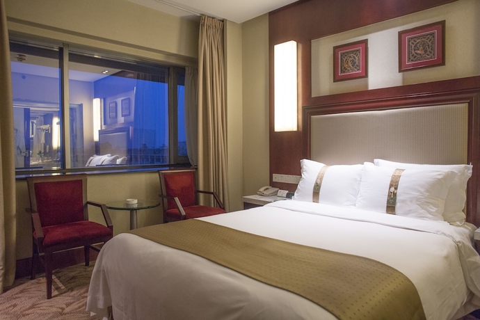 Imagen de la habitación del Hotel Holiday Inn Hangzhou City Center. Foto 14