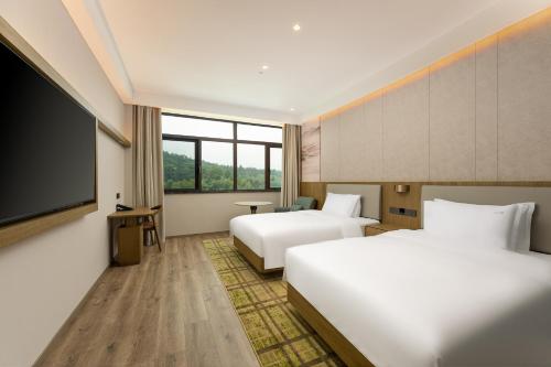 Imagen de la habitación del Hotel Holiday Inn Jiuhua Mountain Hot Spring, an IHG. Foto 13