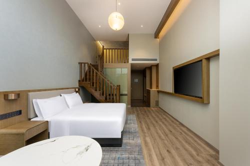 Imagen general del Hotel Holiday Inn Jiuhua Mountain Hot Spring, an IHG. Foto 8