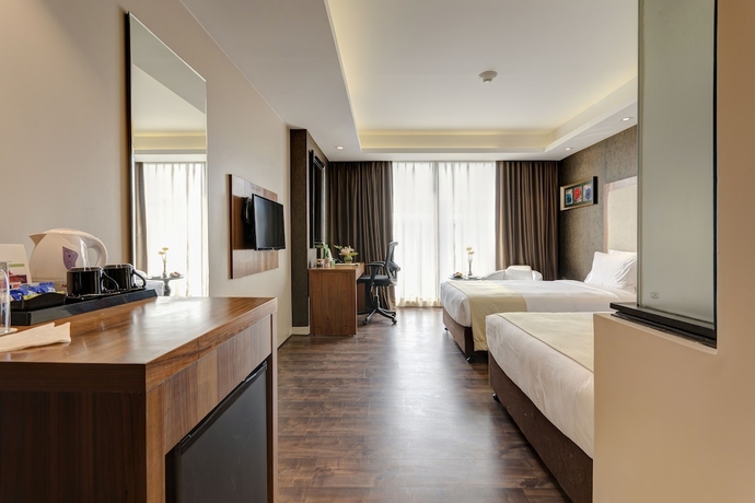 Imagen de la habitación del Hotel Holiday Inn Kolkata Airport, An Ihg. Foto 13