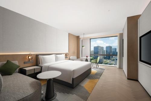 Imagen de la habitación del Hotel Holiday Inn Kunshan East, an IHG. Foto 11