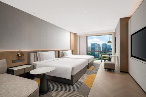 Imagen de la habitación del Hotel Holiday Inn Kunshan East, an IHG. Foto 15
