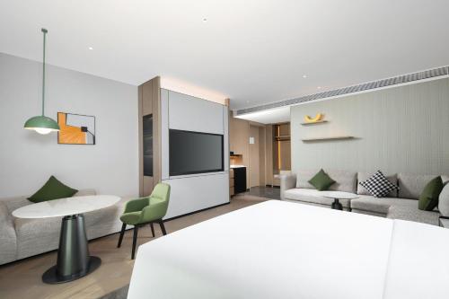 Imagen de la habitación del Hotel Holiday Inn Kunshan East, an IHG. Foto 17