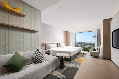 Imagen de la habitación del Hotel Holiday Inn Kunshan East, an IHG. Foto 19