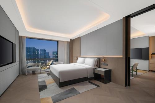 Imagen de la habitación del Hotel Holiday Inn Kunshan East, an IHG. Foto 20