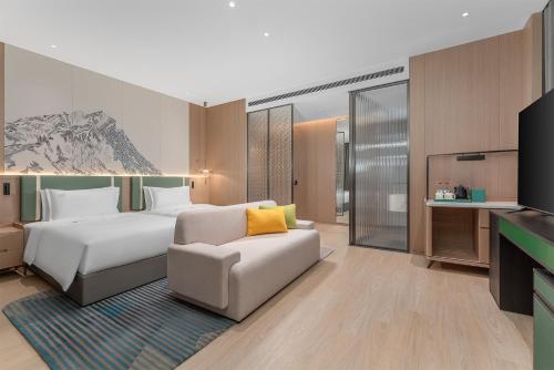 Imagen de la habitación del Hotel Holiday Inn Liaoyuan City Center, an IHG. Foto 15