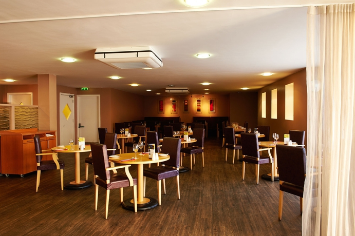 Imagen del bar/restaurante del Hotel Holiday Inn Manchester West, An Ihg. Foto 1