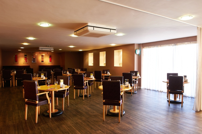 Imagen del bar/restaurante del Hotel Holiday Inn Manchester West, An Ihg. Foto 4