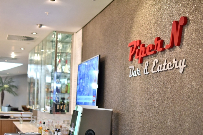 Imagen del bar/restaurante del Hotel Holiday Inn Mauritius Mon Tresor, An Ihg. Foto 4