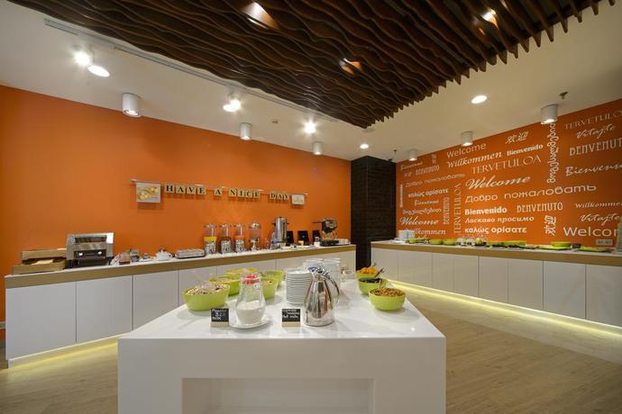 Imagen del bar/restaurante del Hotel Holiday Inn Moscow Seligerskaya, An Ihg. Foto 2