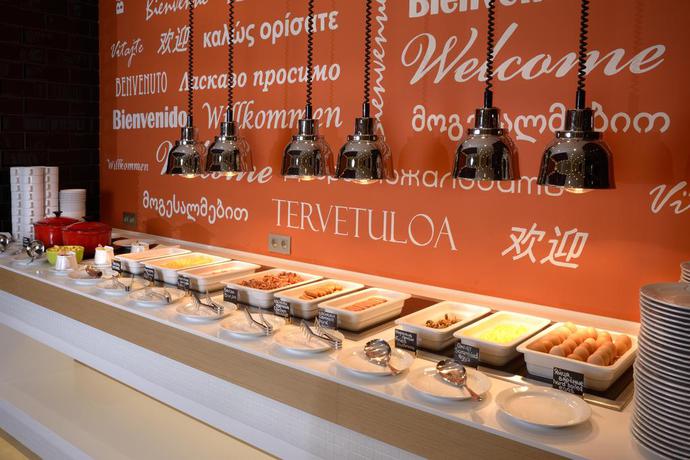 Imagen del bar/restaurante del Hotel Holiday Inn Moscow Seligerskaya, An Ihg. Foto 6