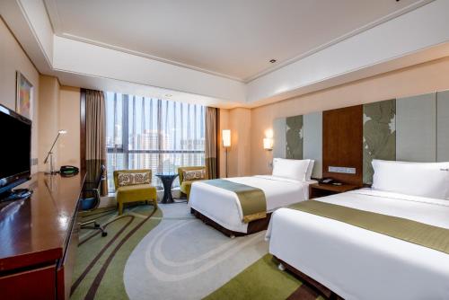 Imagen de la habitación del Hotel Holiday Inn Qingdao City Centre, An Ihg. Foto 5