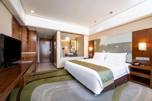 Imagen de la habitación del Hotel Holiday Inn Qingdao City Centre, An Ihg. Foto 6