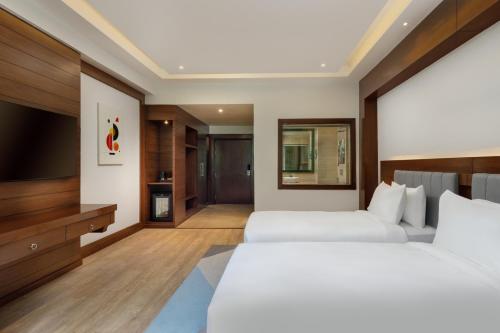 Imagen de la habitación del Hotel Holiday Inn Resort Kathmandu Budhanilkantha by IHG. Foto 11