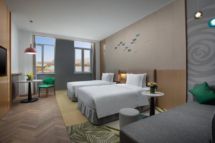 Imagen de la habitación del Hotel Holiday Inn Shanghai Dishui Lake. Foto 6
