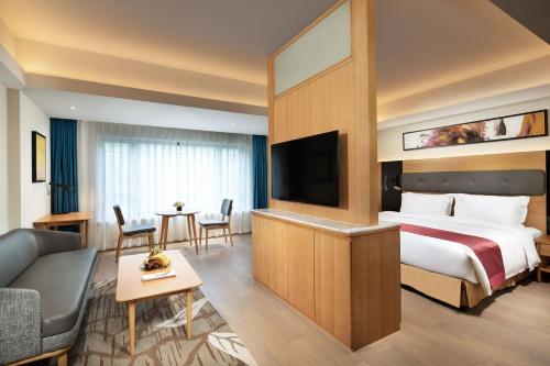 Imagen de la habitación del Hotel Holiday Inn Shanghai Hongqiao Central, An Ihg. Foto 4