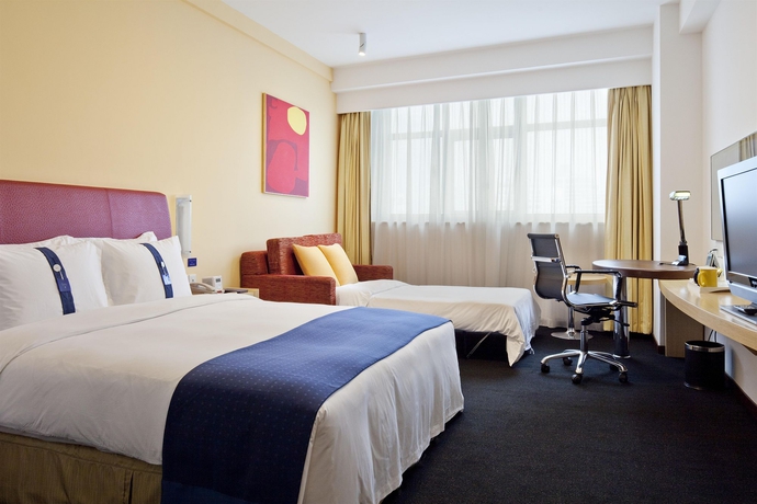 Imagen de la habitación del Hotel Holiday Inn Shanghai Jing'an. Foto 4