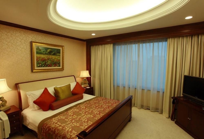 Imagen de la habitación del Hotel Holiday Inn Shanghai Nanjing Road, An Ihg. Foto 8