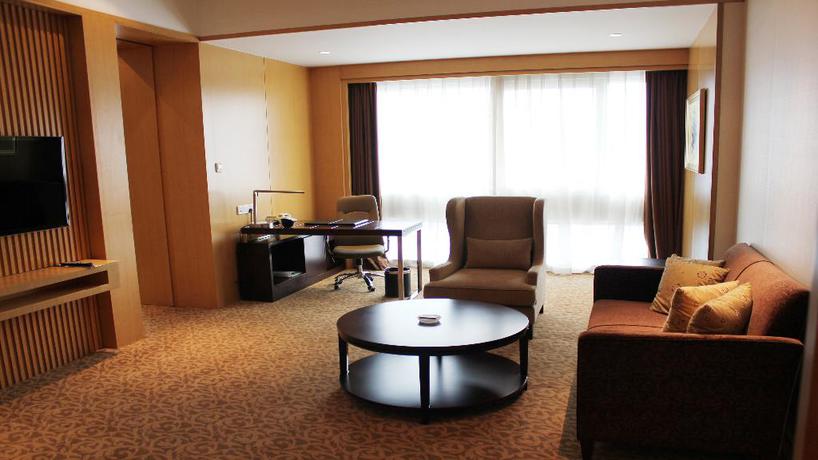 Imagen de la habitación del Hotel Holiday Inn Shijiazhuang Central. Foto 12
