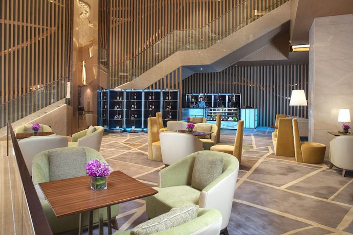 Imagen de la habitación del Hotel Holiday Inn Suzhou Huirong Plaza. Foto 12