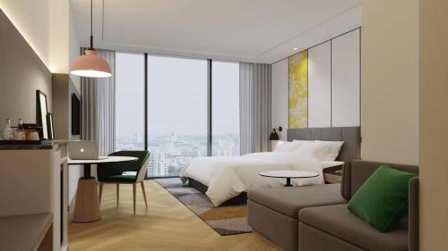 Imagen de la habitación del Hotel Holiday Inn Taiyuan Sunshine, an IHG. Foto 12