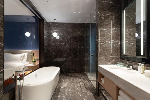 Imagen de la habitación del Hotel Holiday Inn Taiyuan Sunshine, an IHG. Foto 14