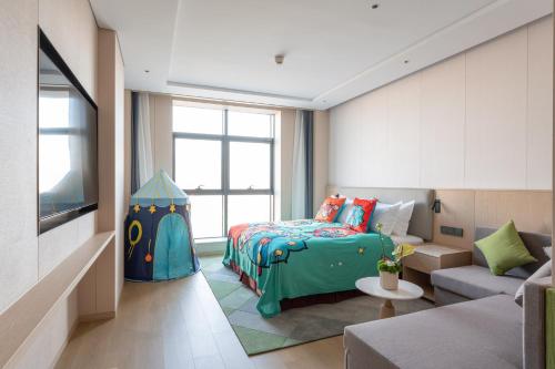 Imagen de la habitación del Hotel Holiday Inn Taiyuan Sunshine, an IHG. Foto 17