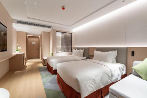 Imagen de la habitación del Hotel Holiday Inn Taiyuan Sunshine, an IHG. Foto 18