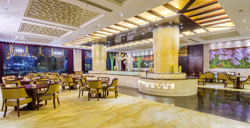 Imagen del bar/restaurante del Hotel Holiday Inn Taizhou Cmc. Foto 8