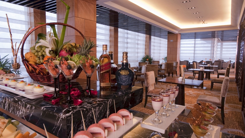 Imagen del bar/restaurante del Hotel Holiday Inn Tianjin Riverside, An Ihg. Foto 5