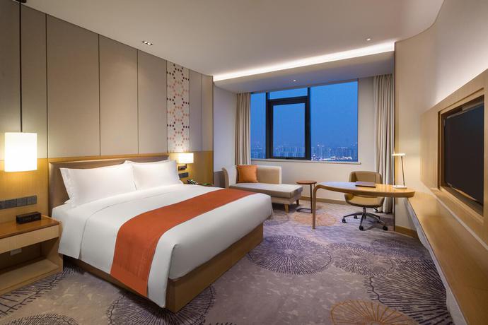 Imagen de la habitación del Hotel Holiday Inn Tianjin Xiqing. Foto 5