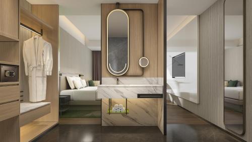 Imagen de la habitación del Hotel Holiday Inn Wuhan Houguan Lake, an IHG. Foto 15