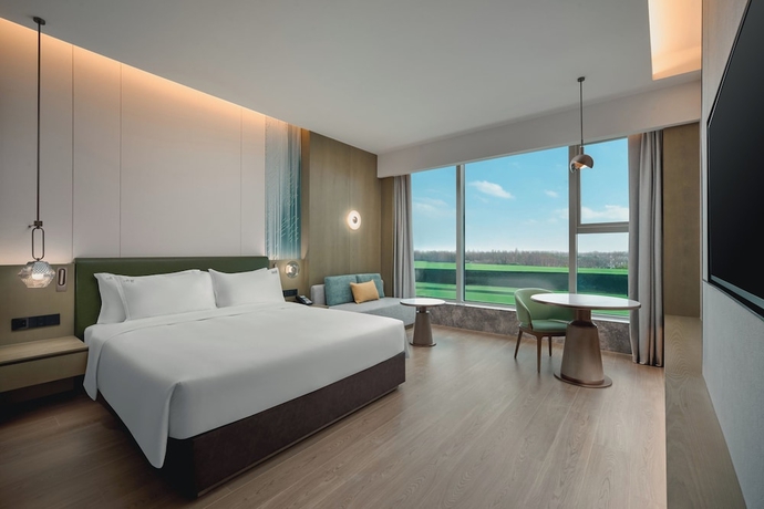 Imagen de la habitación del Hotel Holiday Inn Wuhan Tianhe Airport by IHG. Foto 2