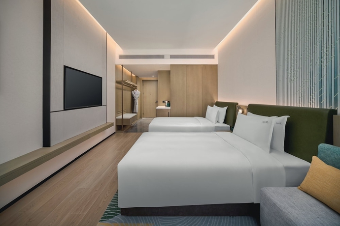 Imagen de la habitación del Hotel Holiday Inn Wuhan Tianhe Airport by IHG. Foto 13