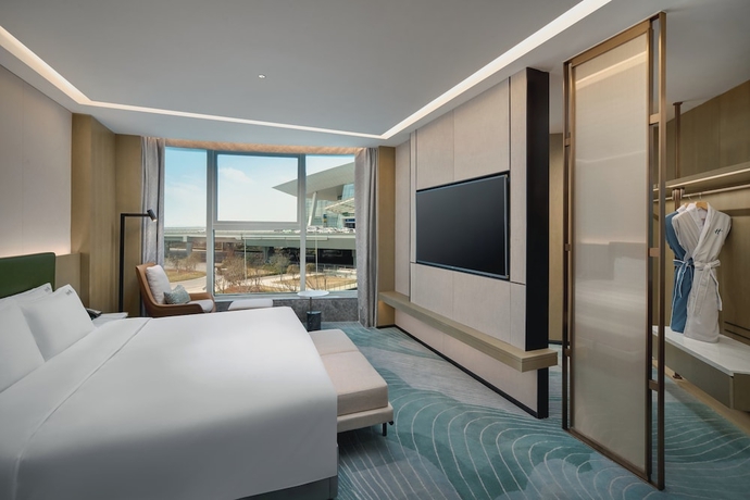 Imagen de la habitación del Hotel Holiday Inn Wuhan Tianhe Airport by IHG. Foto 15