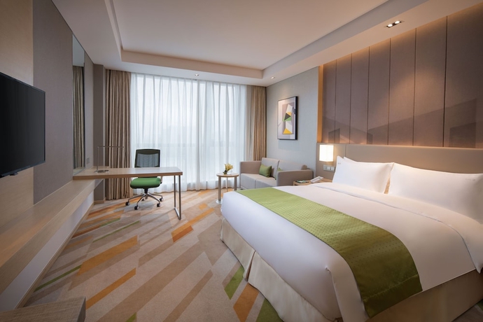 Imagen de la habitación del Hotel Holiday Inn Wuxi Taihu New City. Foto 13