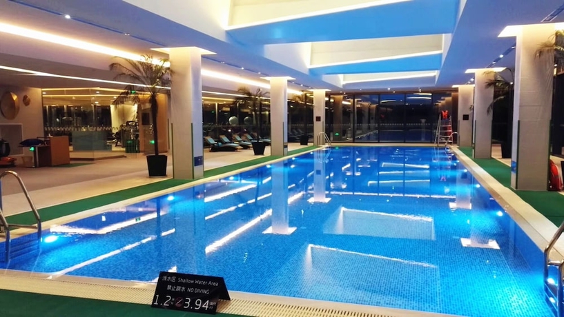 Imagen de la piscina del Hotel Holiday Inn Wuxi Taihu New City. Foto 19