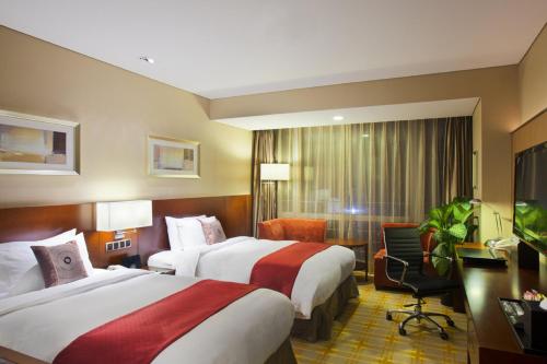 Imagen de la habitación del Hotel Holiday Inn Yinchuan International Trade Centre. Foto 7