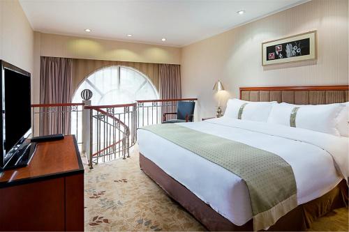 Imagen de la habitación del Hotel Holiday Inn Zhengzhou, An Ihg. Foto 6