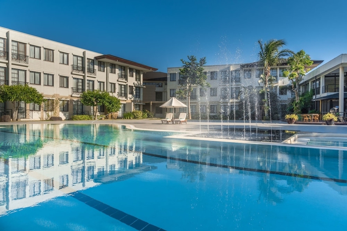 Imagen de la piscina del Hotel Holiday Inn & Suites Batangas LimaPark by IHG. Foto 19
