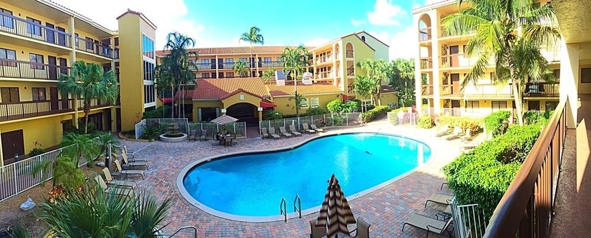 Imagen de la piscina del Hotel Holiday Inn and Suites Boca Raton - North, An Ihg. Foto 9
