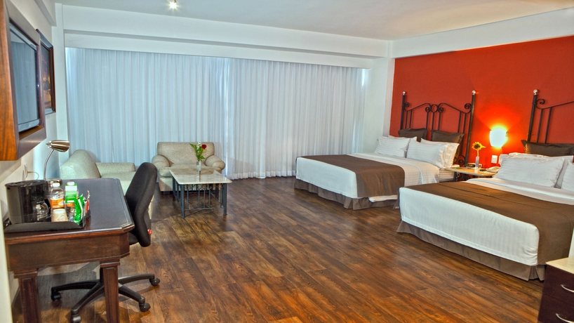 Imagen de la habitación del Hotel Holiday Inn and Suites Guadalajara-centro Historico, An Ihg. Foto 5