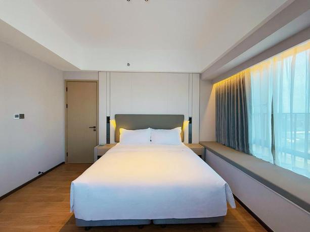 Imagen de la habitación del Hotel Holiday Inn and Suites Guangzhou South Station by IHG. Foto 3