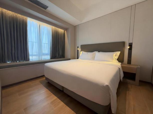 Imagen de la habitación del Hotel Holiday Inn and Suites Guangzhou South Station by IHG. Foto 4